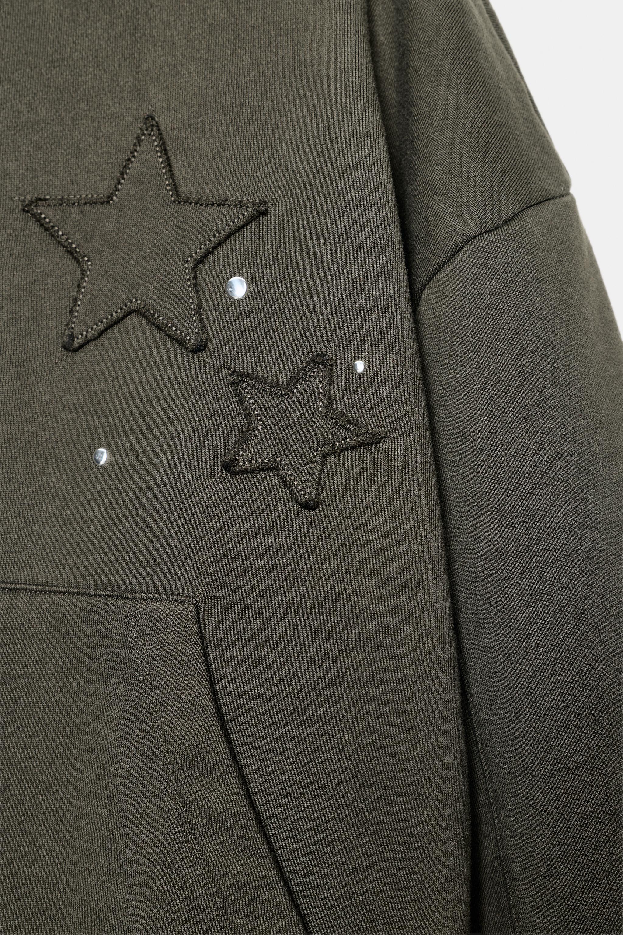 WASHED STAR STUD SWEATSHIRT